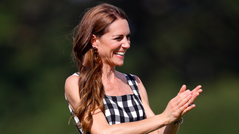 Kate Middleton laughing and clapping
