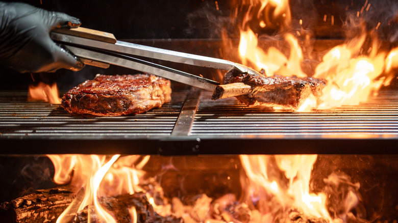 Meat cooking on a grill