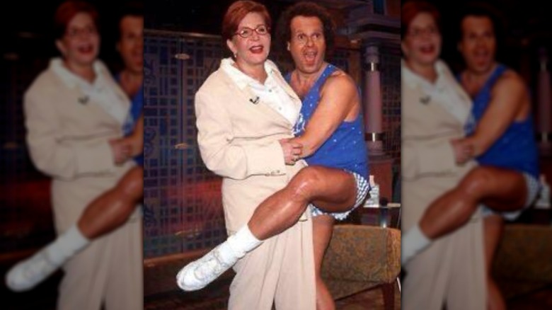 Richard Simmons laughing with Sally Jessy Raphael