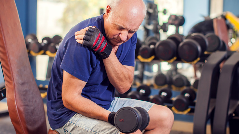 Man straining during a workout