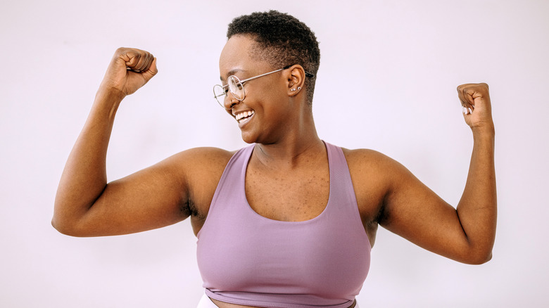 Woman showing off her muscles