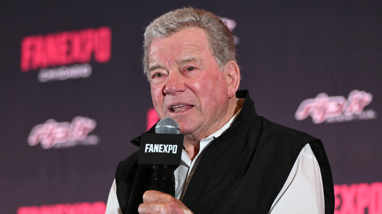 William Shatner talking into a microphone