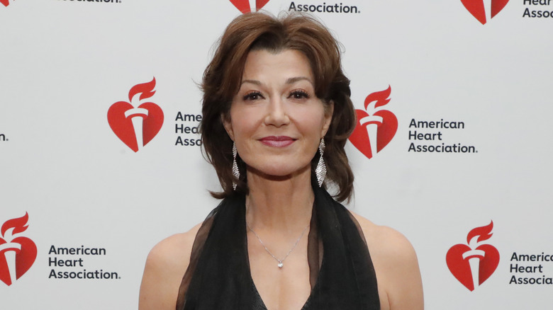 Amy Grant posing in a black outfit